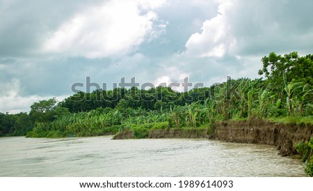 A beautiful landscape of Bangladesh. Great picture of a river. A scene of river breaking. During the monsoon season, the water level in the river rises and causes erosion.