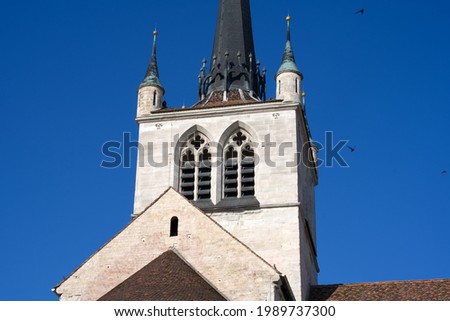 Close-up of old protestant roman church at the old town of Payerne at summertime. Photo taken June 11th, 2021, Payerne, Switzerland.