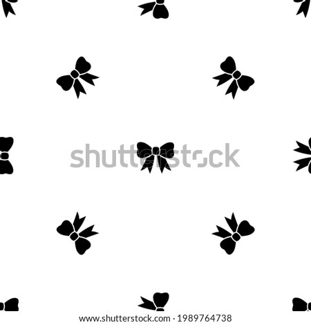 Seamless pattern of repeated black bow symbols. Elements are evenly spaced and some are rotated. Vector illustration on white background