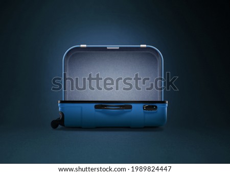Open the classic suitcase, ready for travel. Royalty-Free Stock Photo #1989824447