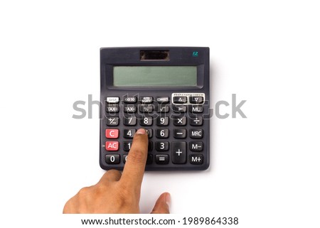Black calculator on white background isolated stock image.
