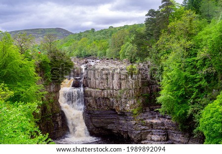 Beautiful High Force waterfall in Upper Teesdale, County Durham, England in spring Royalty-Free Stock Photo #1989892094