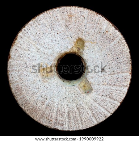  Aged  old  stone concrete wheel for mill. Isolated on black