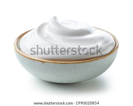 bowl of whipped egg whites cream isolated on white background Royalty-Free Stock Photo #1990020854