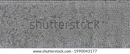 Old cobblestone road top aerial drone view Royalty-Free Stock Photo #1990043177