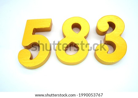 Arabic numerals 583 gold on white background                               