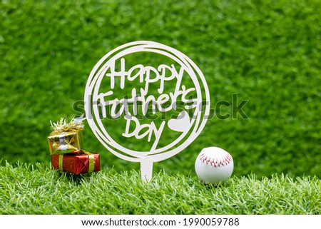Happy Father's Day to Baseball player with ball on green grass
