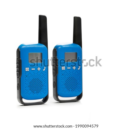Blue walkie talkie with black keypad isolated over white background
