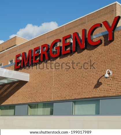 Hospital Emergency Room Sign. A sign outside a hospital identifying the emergency room.                     