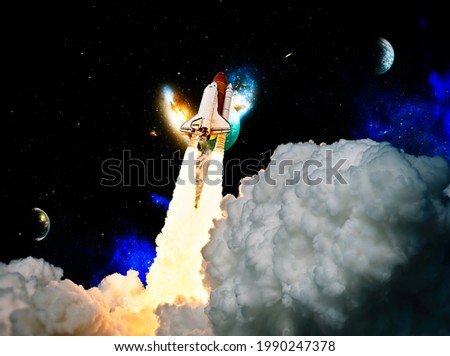 Rocket launch. Rocket with smoke flies into space. Space Shuttle .Spaceship begins the mission. Elements of this image furnished by NASA