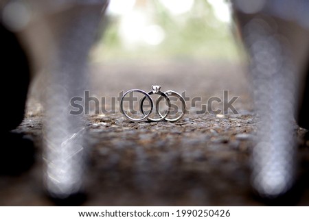 three black and white wedding rings