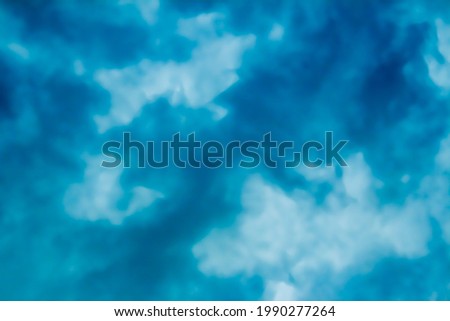 Blue and white colored blurred soft gradient abstract background
