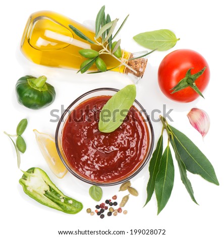  Red  sauce and the ingredients ( olive oil, spices, lemon, tomato), isolated on white. View from above.  Royalty-Free Stock Photo #199028072