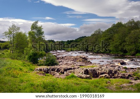 River Tees in spring in Upper Teesdale, County Durham, England Royalty-Free Stock Photo #1990318169
