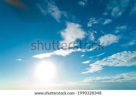 Blue sky with white clouds. Clear sunny day