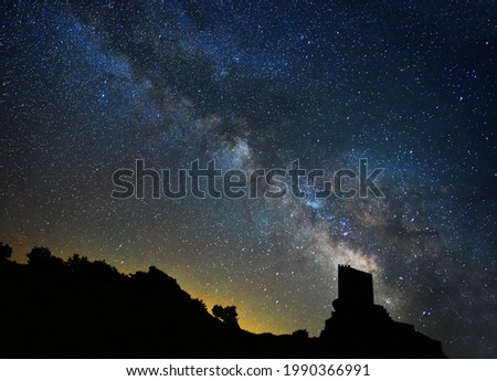 The milky way and an old castle in spain