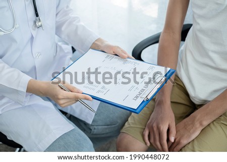 Female doctors who treat patients make an appointment to listen to the results after a physical examination and explain medical information and diagnose the disease. Medical concepts and good health.