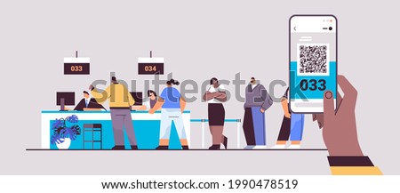 mix race people looking at display number board in waiting room electronic queuing system queue management Royalty-Free Stock Photo #1990478519