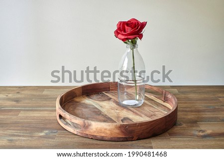 A studio photo of a wooden coffee tray