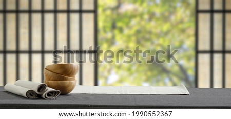 Wooden desk of free space for your decoration and blurred window background 