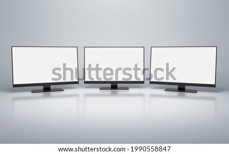 Row of computer monitors with white blank screens. clipping path. 3d rendering