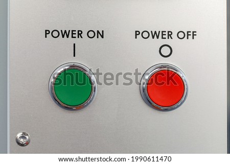 Power On Off Green and Red Push Buttons Control Royalty-Free Stock Photo #1990611470