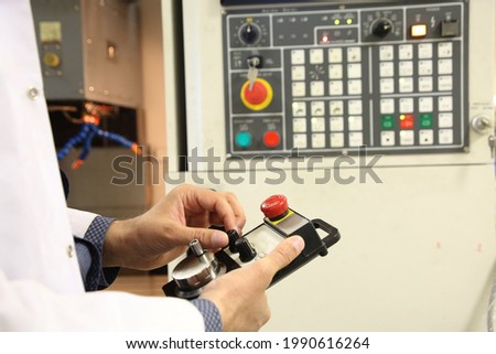 industrial worker working with machine
