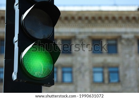View of traffic light in city on sunny day, closeup. Space for text