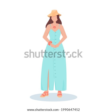 Woman in a blue summer sundress and a straw hat.