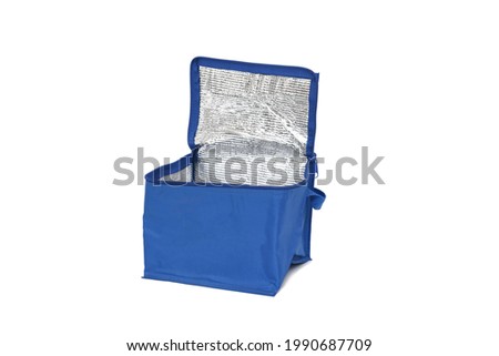 Travel heat resistant refrigerator bag for storing food and not only blue color on a white insulated background Royalty-Free Stock Photo #1990687709