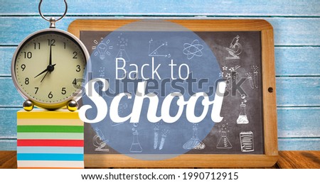 Composition of text back to school in white with clock and chalkboard. school, education and study concept digitally generated image.