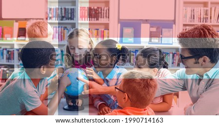 Composition of norwegian flag over smiling male teacher looking at globe with children in library. school, education and study concept digitally generated video.