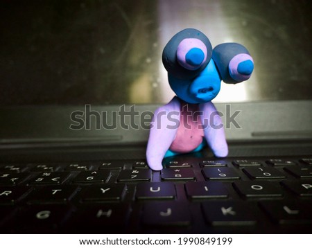 Clay soft toy pressing laptop key board technology education concept