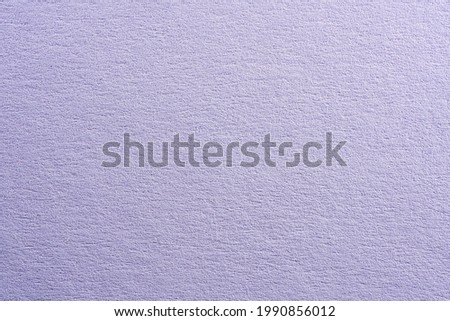 Colored paper with strong structure as a background, photographed in the studio                         