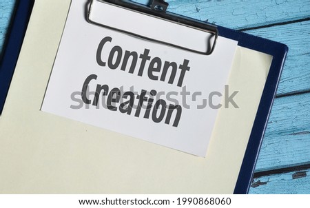 Top view image of clipboard file with Content Creation wording. Selective focus image