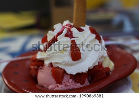 A yummy strawberry ice cream on a plate