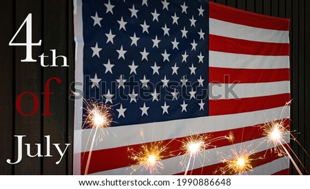 Happy 4th of July - Independence Day USA background template greeting card -  Waving American flag and sparkling sparklers firework on rustic wooden boards, wood wall