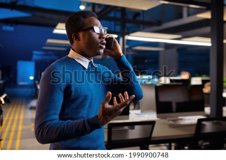 Manager talking by phone, office lifestyle