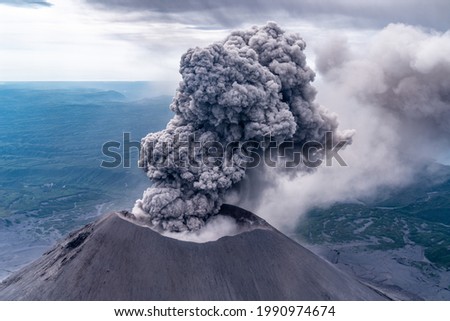Volcano Karymsky explosion on Kamchatka Royalty-Free Stock Photo #1990974674