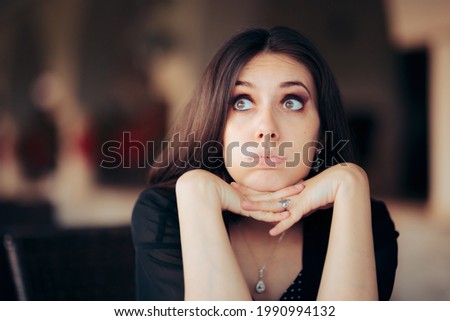 Worried Woman Looking Up Feeling Concerned and Stressed Out. Anxious female feeling bored puffing and grumbling 
