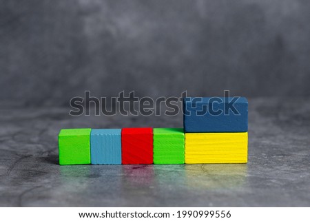 Sample Cube Rectangular Boxes Polished With Multi-Colour Symbolizing Stability Growth Development Aligned On Surface With Different Perspective Bounded By E-Supplies Accesories