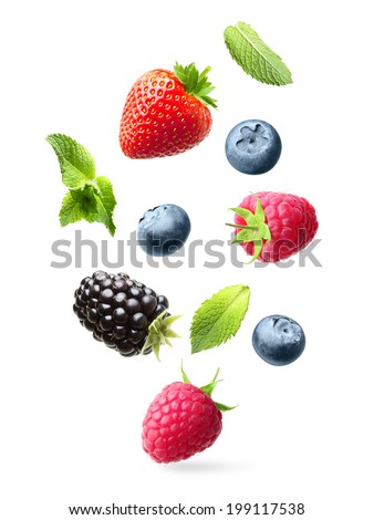 Falling berries with green mint leaves isolated on white background Royalty-Free Stock Photo #199117538