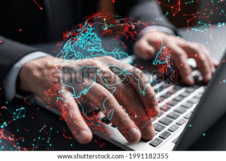 Businessman search for new opportunities, in international business, typing laptop background. World map hologram.