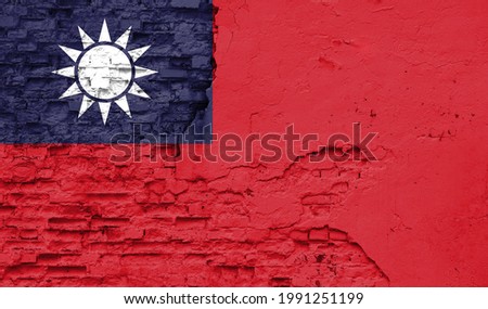 Taiwan flag is painted onto an old brick wall