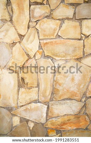 Stone wall background close up.