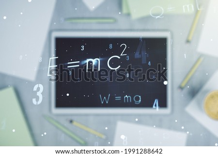 Creative scientific formula illustration and modern digital tablet on desktop on background, top view, science and research concept. Multiexposure