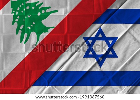 Concept of the relationship between Lebanon and Israel  with two flags over each other
