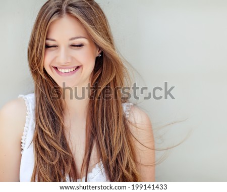 Beautiful woman smiling Royalty-Free Stock Photo #199141433