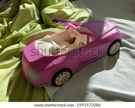 kids plastic toy car convertible at home.