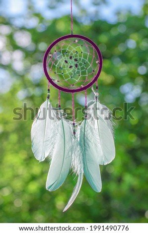 Dreamcatcher, american native amulet in forest. Shaman